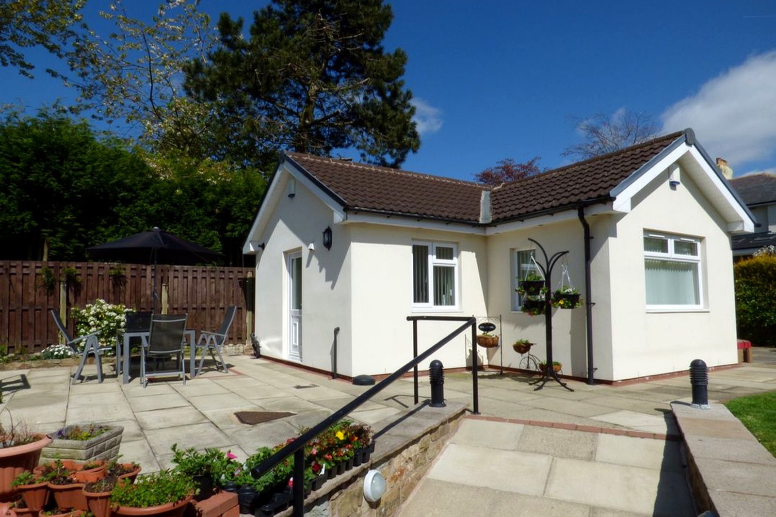 Exterior arrival view and patio at The Bungalow Burnley